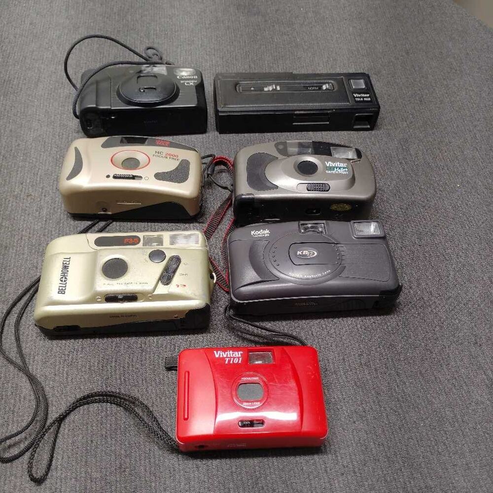 Vintage 7 Film Camera Lot Canon Vivitar Kodak Bell Howell Tested Works